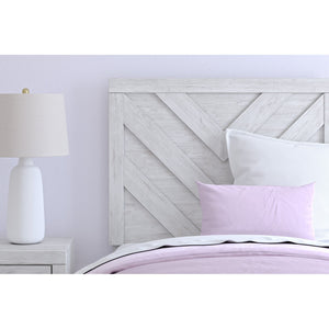 Detail view of Cayboni White Twin Panel Bed
