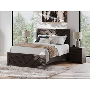 A room setting featuring Prendonea Charcoal Queen Panel Bed