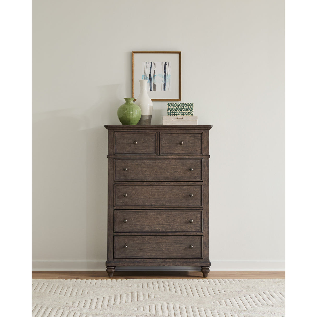 A room setting featuring Paola Gray 5 Drawer Chest