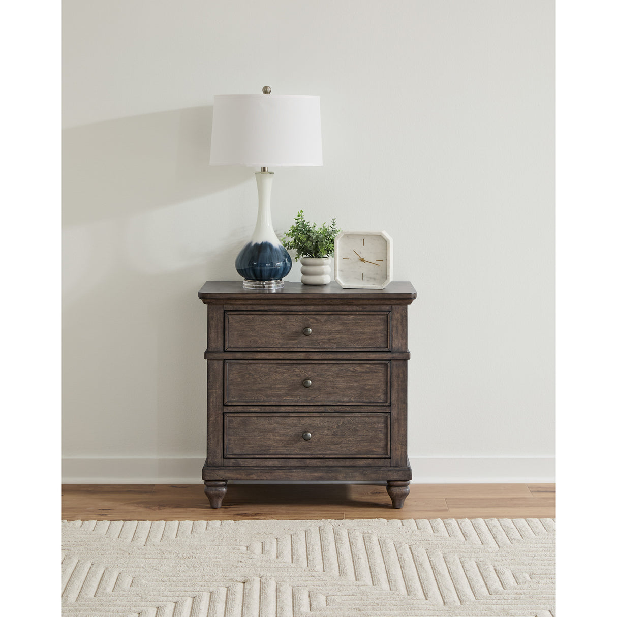 A room setting featuring Paola Gray Nightstand