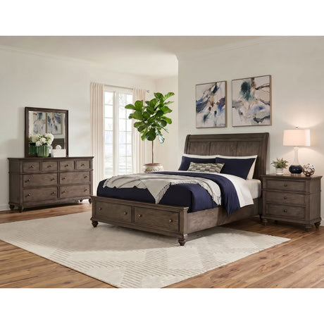 A room setting featuring Paola Gray Queen 4 Piece Room Group