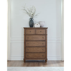 A room setting featuring Paola Chestnut 5 Drawer Chest