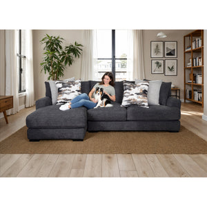 A room setting featuring Vale Slate 2 Piece Left Chaise Sofa