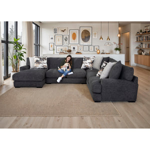 A room setting featuring Vale Slate 4 Piece Left Chaise Sectional