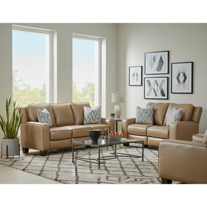 A room setting featuring Primrose Hill Toast Leather Power Reclining Sofa