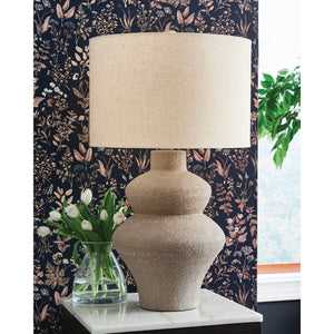 A room setting featuring Jossleigh Beige Table Lamp