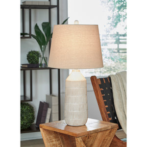 A room setting featuring Willport WhiteTable Lamp