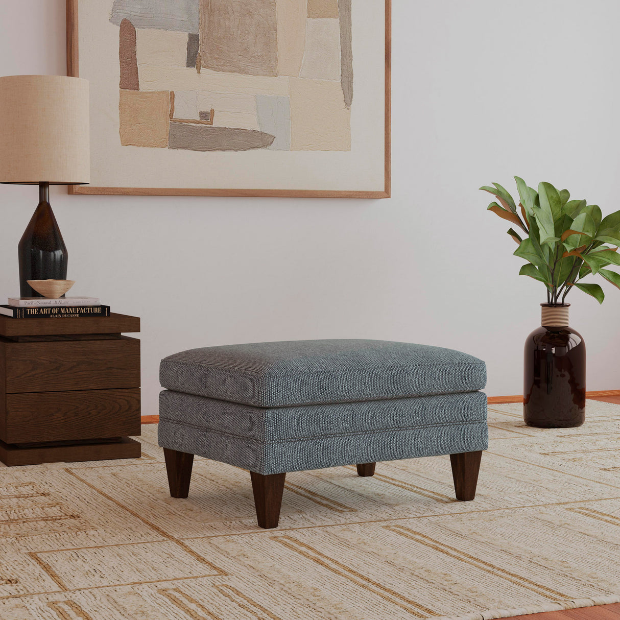 A room setting featuring Eleanora Blue Ottoman