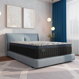 A room setting featuring Slumberland Midnight Select Medium Pillowtop Twin Mattress