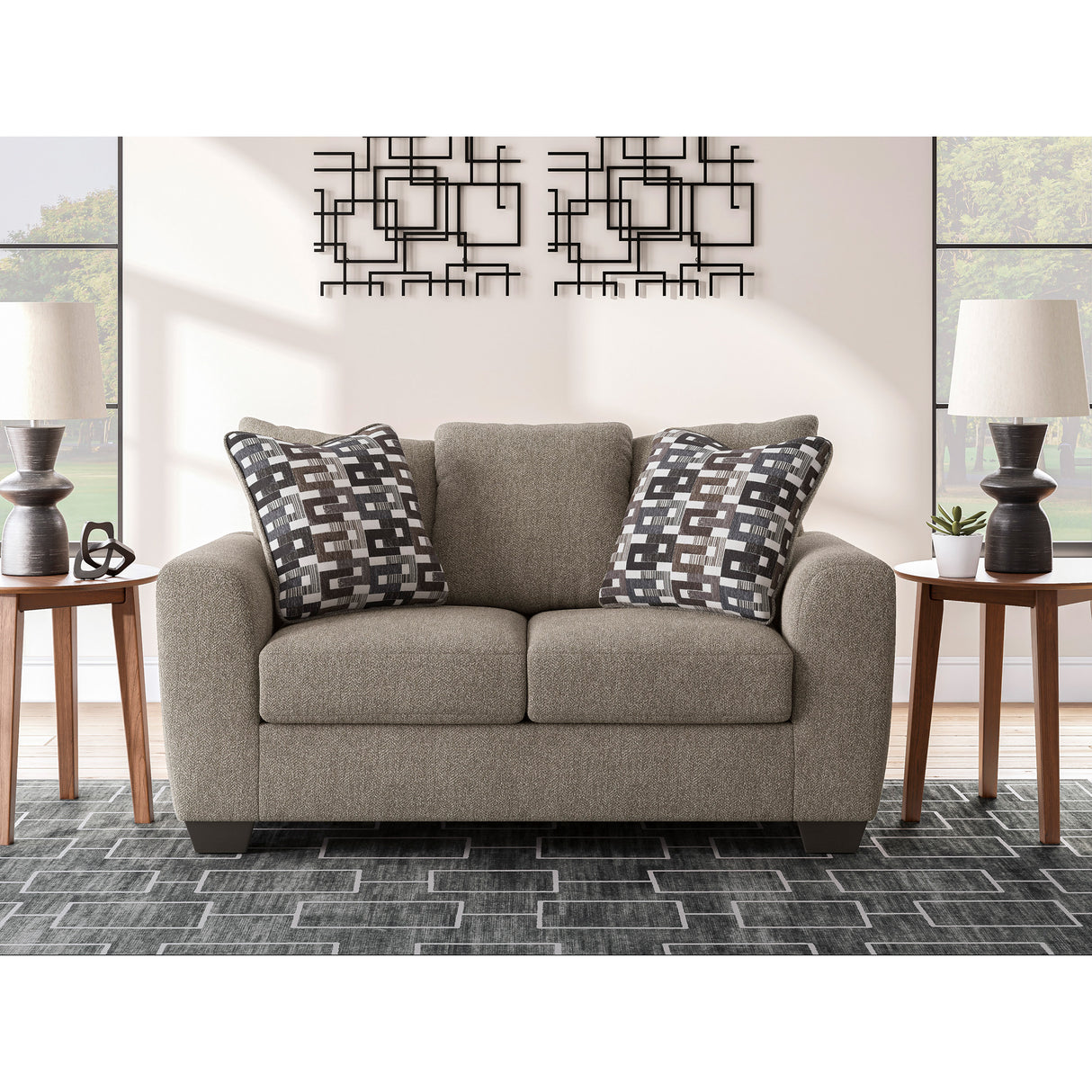 A room setting featuring Triston-Peaks Suede Loveseat
