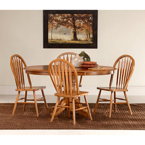 A room setting featuring Jefferson Chestnut 5 Piece Arrow Back Pedestal Dining Set
