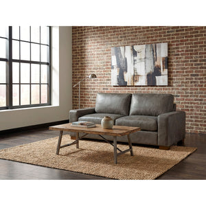 A room setting featuring Juno Gray Feather Blend Leather Loveseat