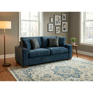 A room setting featuring Juno Ink Loveseat