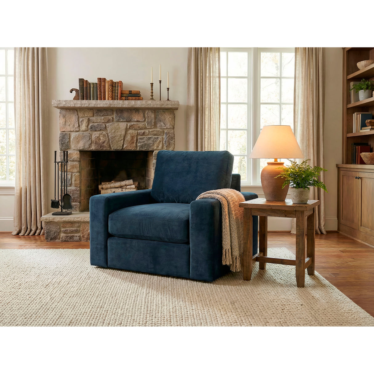 A room setting featuring Juno Ink Swivel Chair