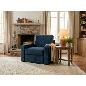 A room setting featuring Juno Ink Swivel Chair