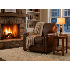 A room setting featuring Warren Chocolate Feather Blend Leather Nail Head Chair