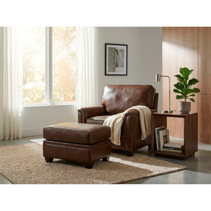 A room setting featuring Warren Chocolate Feather Blend Leather Ottoman