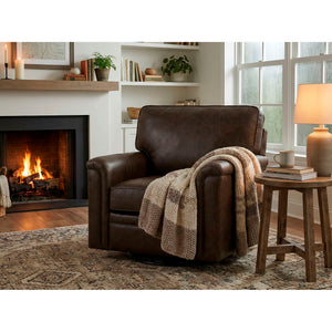 A room setting featuring Warren Chocolate Feather Blend Leather Swivel Chair