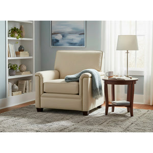 A room setting featuring Warren Twine Nail Head Chair