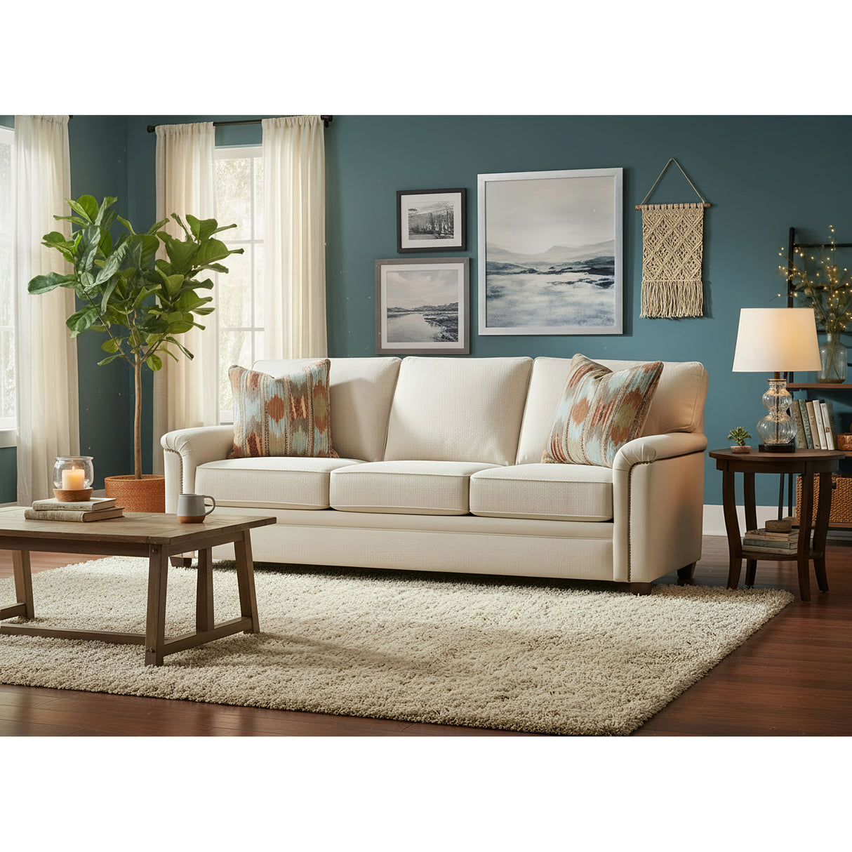 A room setting featuring Warren Twine Nail Head Queen Sofa Sleeper