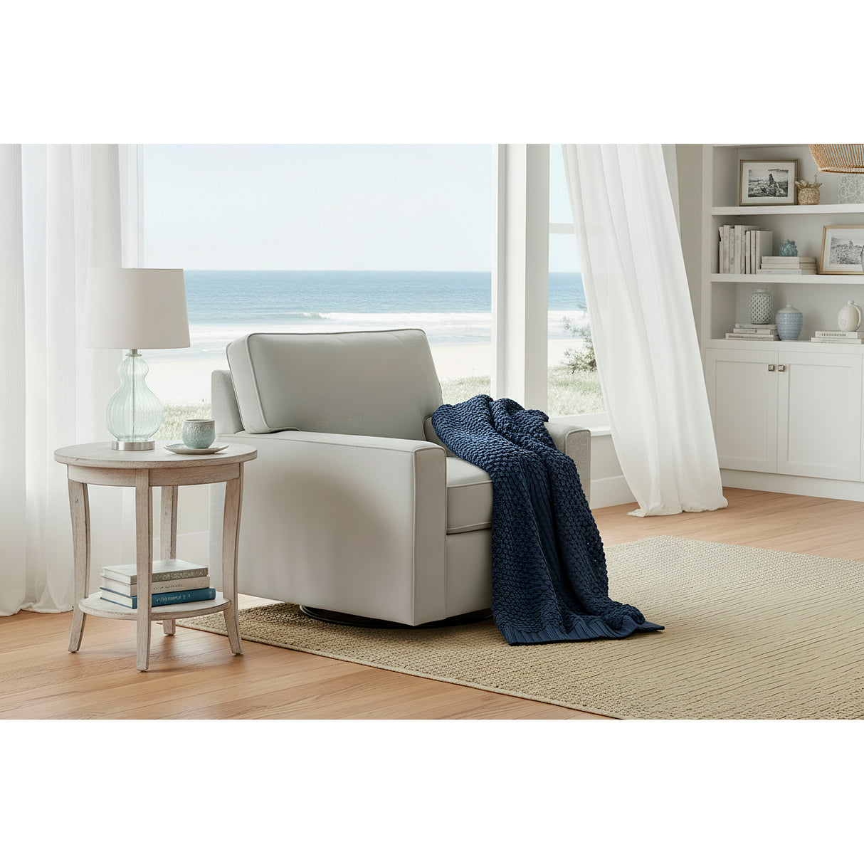 A room setting featuring Merritt Sterling Swivel Chair