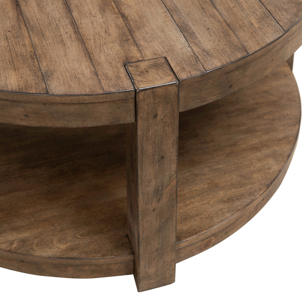 Detail view 2 of Broadmore Cobblestone Brown Round Cocktail Table