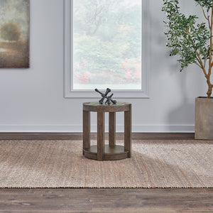A room setting featuring Broadmore Cobblestone Brown Round Chairside Table
