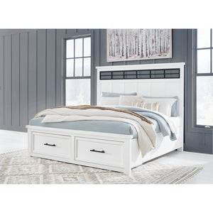 A room setting featuring Ashbryn White King Storage Bed