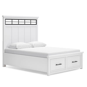 White bed with metal headboard and storage drawers on a white background