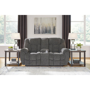 A room setting featuring Foreside Charcoal Reclining Console Loveseat