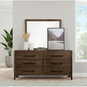A room setting featuring Norwich Rustic Driftwood Oak 6 Drawer Dresser