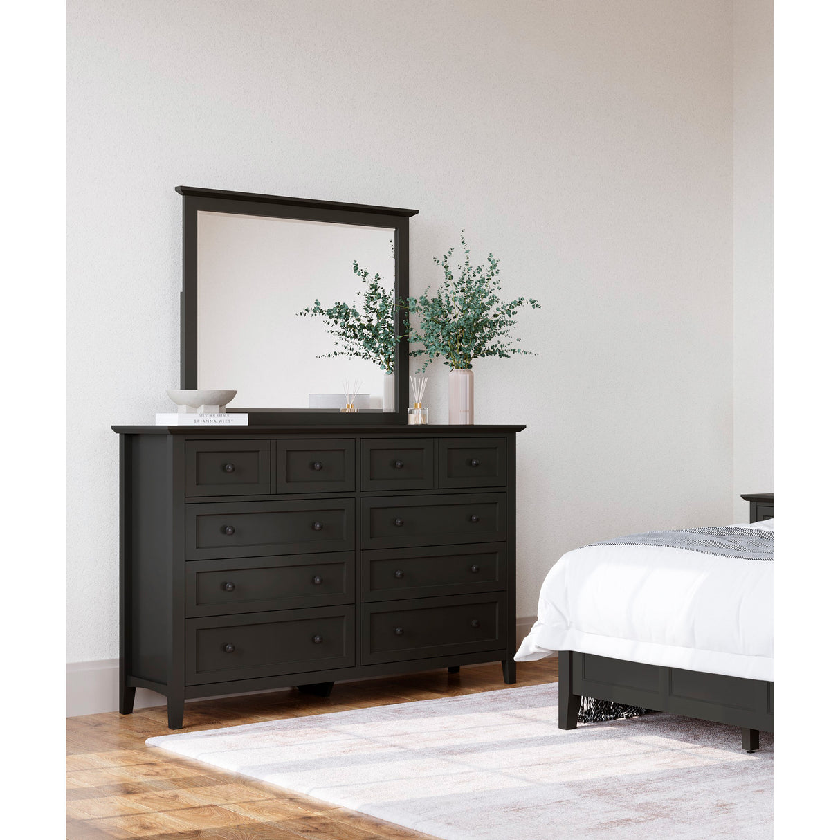 A room setting featuring Grace Raven Mirror