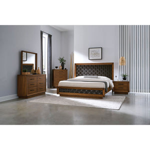 A room setting featuring Black Diamond Casual Honey Queen Panel Bed