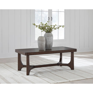 A room setting featuring Korestone Dark Brown Cocktail Table