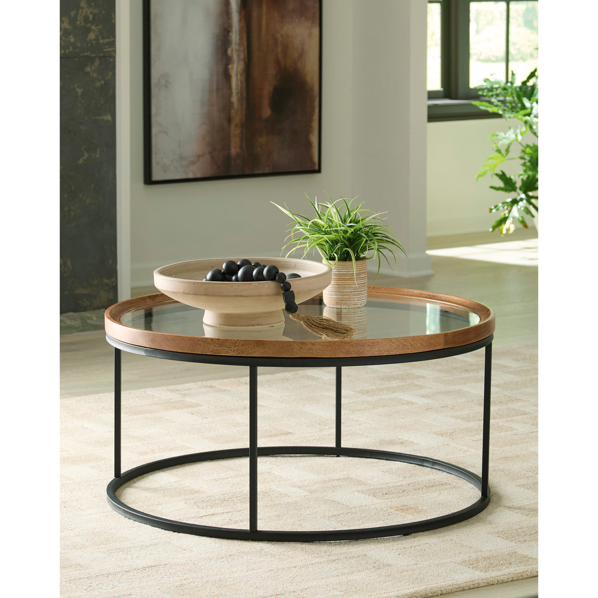 A room setting featuring Noraluna Brown Cocktail Table