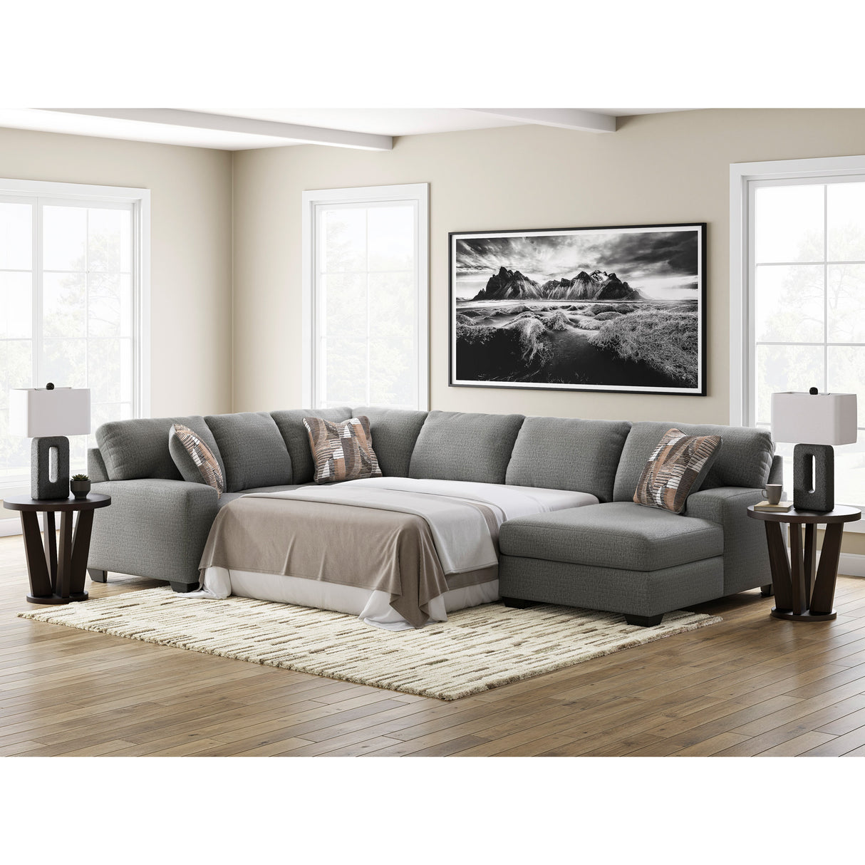 A room setting featuring Full Greystone Seyler Lane 3 Piece Right Chaise Sleeper Sectional