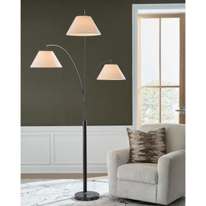 A room setting featuring Gibbswellner Black Arc Lamp