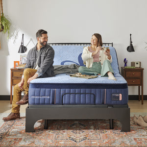 A room setting featuring Twin XL Blue Lux Hybrid Elite Medium Mattress