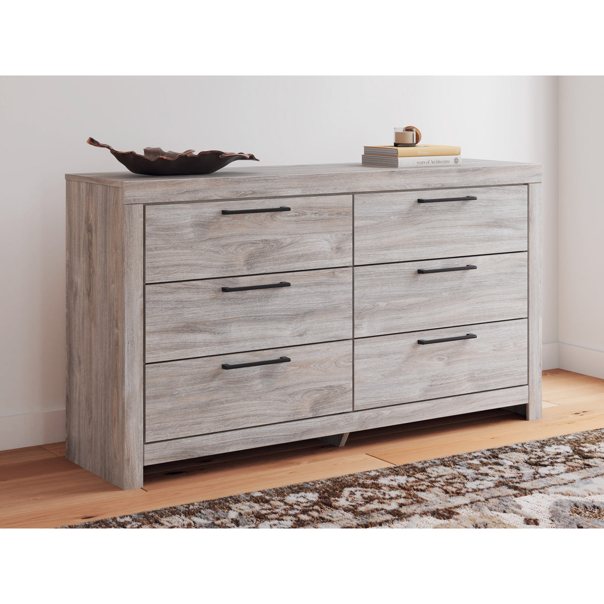A room setting featuring Broachmyn Gray Dresser