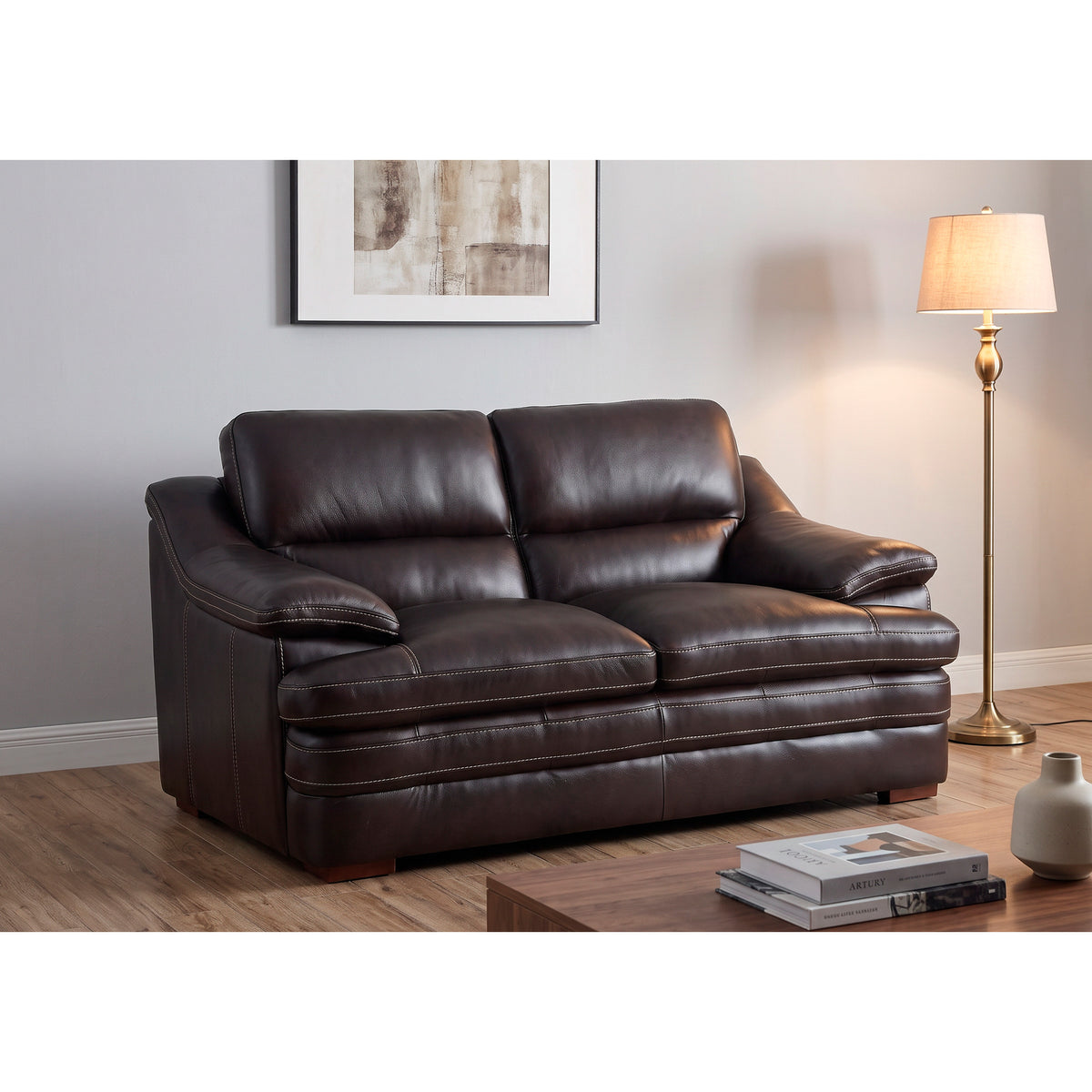 A room setting featuring Ellsworth Dark Brown Loveseat