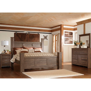 A room setting featuring Juararo 4 Piece Dark Brown King Poster Room Group