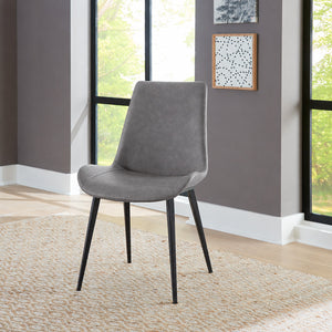 A room setting featuring Nicoya Steel Gray Dining Chair