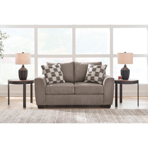 A room setting featuring Loreo Truffle Loveseat