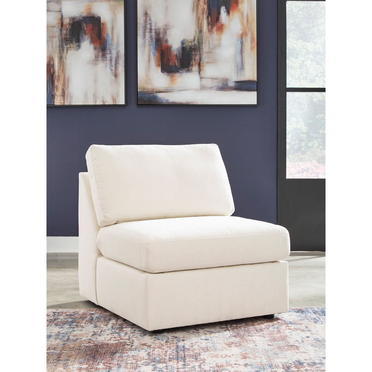 A room setting featuring Modmax Oyster Armless Chair