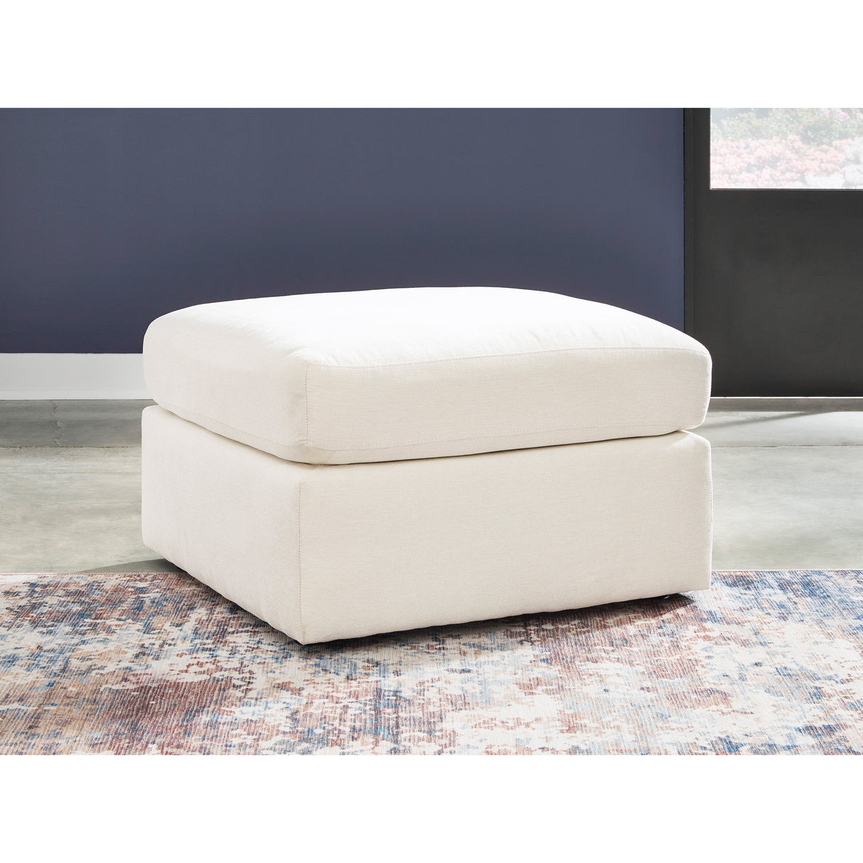 A room setting featuring Modmax Oyster Ottoman
