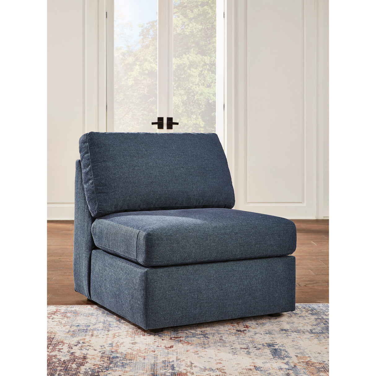A room setting featuring Modmax Ink Armless Chair