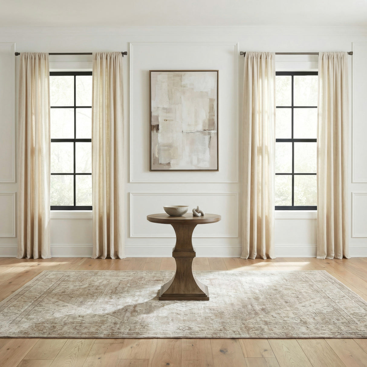 A room setting featuring Artisan Home Sienna Stone Round Chairside Table