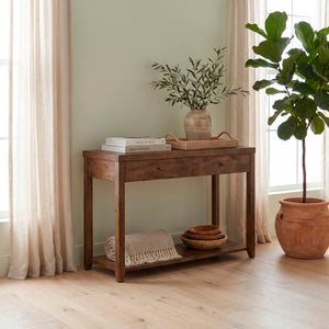 A room setting featuring Mitchell Nutmeg Sofa Table