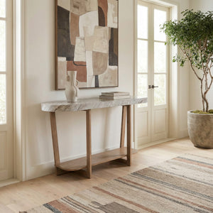 A room setting featuring Danby Alabaster Sofa Table