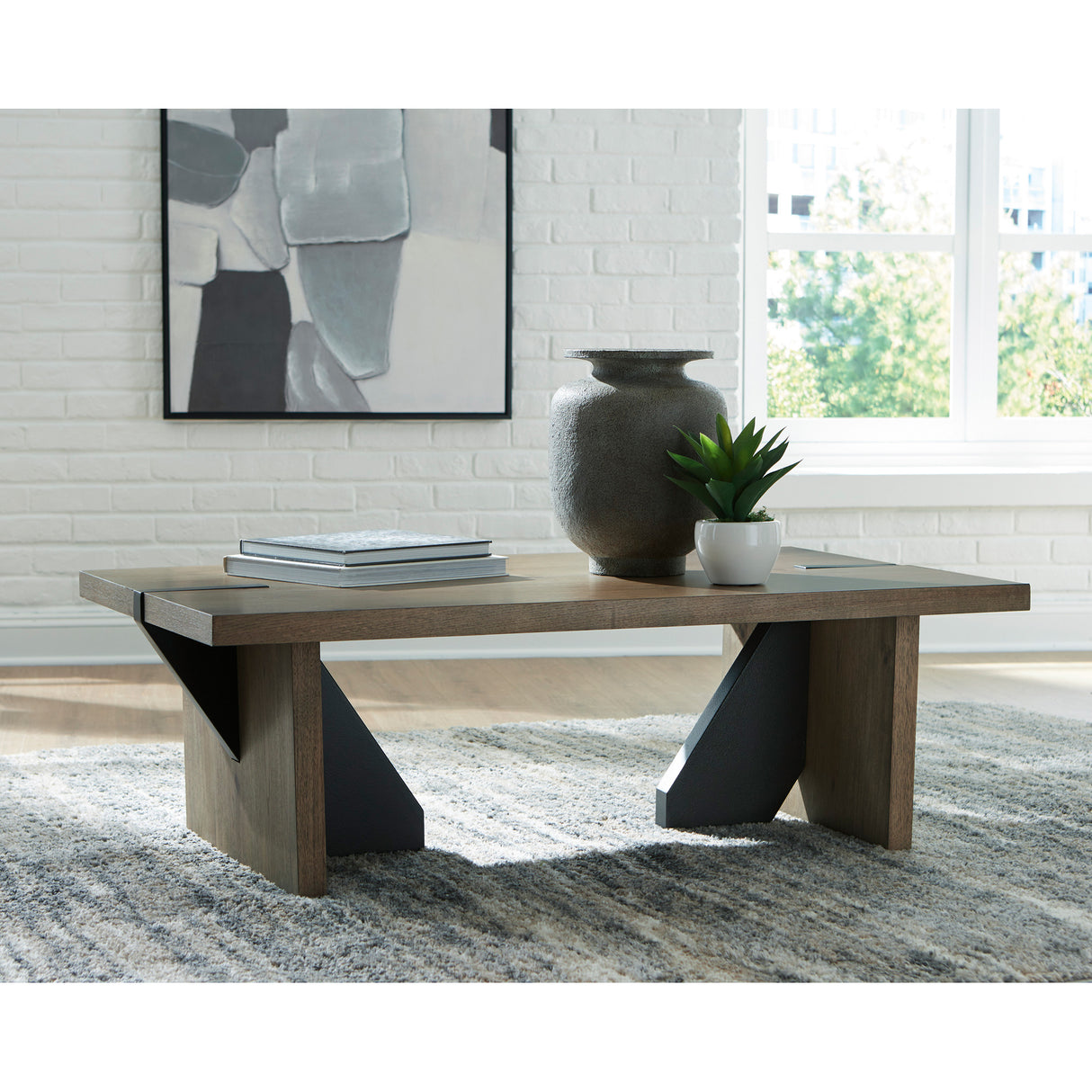 A room setting featuring Kandinew Brown Rectangular Coffee Table